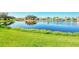 Peaceful lakefront community with lush landscaping at 3238 Osprey Ln, Port Charlotte, FL 33953