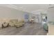 Open concept living and dining space with neutral colors at 3238 Osprey Ln, Port Charlotte, FL 33953