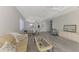 Bright and airy living room with hardwood floors and large windows at 3238 Osprey Ln, Port Charlotte, FL 33953
