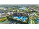 Resort-style community pool with spacious deck and surrounding amenities at 11564 Renaissance Blvd, Venice, FL 34293