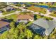 Aerial view showing home with pool and canal access at 2 Marker Rd, Rotonda West, FL 33947