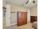 Well-lit bedroom with wood flooring and ample closet space at 2 Marker Rd, Rotonda West, FL 33947