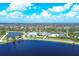 Community with lake and recreational facilities at 2 Marker Rd, Rotonda West, FL 33947