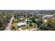 Aerial view showcasing a house, landscape, and surrounding neighborhood at 445 Stewart St, Englewood, FL 34223