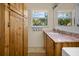 Bathroom with granite countertop and wooden cabinets at 445 Stewart St, Englewood, FL 34223