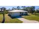 Newly renovated single story home with metal roof and large yard at 445 Stewart St, Englewood, FL 34223