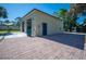 Detached garage with additional storage space at 445 Stewart St, Englewood, FL 34223