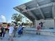 Outdoor stage with live music and people dancing at 445 Stewart St, Englewood, FL 34223