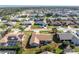 Aerial view showcasing a single-Gathering home in a residential neighborhood at 5826 Harrison Rd, Venice, FL 34293