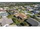 Aerial view of single-Gathering home in residential neighborhood at 5826 Harrison Rd, Venice, FL 34293