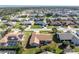 Aerial view showcasing a single-Gathering home in a residential neighborhood at 5826 Harrison Rd, Venice, FL 34293