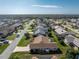 Aerial view of single-Gathering home in residential neighborhood at 5826 Harrison Rd, Venice, FL 34293