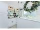 Elegant bathroom featuring double sinks and a walk-in shower at 5826 Harrison Rd, Venice, FL 34293