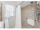 Bathroom with walk in shower and grab bars at 5826 Harrison Rd, Venice, FL 34293