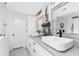 Modern bathroom with double vanity and marble countertops at 5826 Harrison Rd, Venice, FL 34293