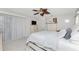 Bright bedroom with a comfortable bed and ample closet space at 5826 Harrison Rd, Venice, FL 34293