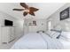 Main bedroom with king-size bed and plenty of closet space at 5826 Harrison Rd, Venice, FL 34293