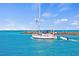 Sailboat approaching a harbor entrance, suggesting a life of leisure and adventure at 5826 Harrison Rd, Venice, FL 34293