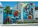 Building with large mural of birds and flowers at 5826 Harrison Rd, Venice, FL 34293