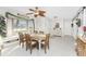 Dining area with a table for six and a charming bay window at 5826 Harrison Rd, Venice, FL 34293