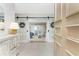 Entryway with barn doors opening to living room at 5826 Harrison Rd, Venice, FL 34293