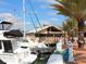 Relaxed waterfront restaurant scene, with boats docked nearby creating a vibrant atmosphere at 5826 Harrison Rd, Venice, FL 34293