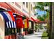 Venice street scene with flags and shops at 5826 Harrison Rd, Venice, FL 34293