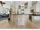 Bright kitchen featuring a breakfast bar, granite countertops, and stainless appliances at 3117 Silkwood Ln, Port Charlotte, FL 33953