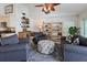 Cozy living room with plush seating and coastal decor at 3117 Silkwood Ln, Port Charlotte, FL 33953