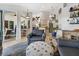 Living room with neutral decor and a view of the connected kitchen at 3117 Silkwood Ln, Port Charlotte, FL 33953