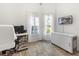Bright office featuring natural light and neutral walls at 3117 Silkwood Ln, Port Charlotte, FL 33953