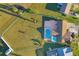 Aerial view of house, pool, and large backyard at 6358 Granger Rd, Port Charlotte, FL 33981