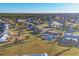 Aerial view of neighborhood with houses and pools at 6358 Granger Rd, Port Charlotte, FL 33981