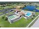 Community pool, tennis courts, and clubhouse at 6358 Granger Rd, Port Charlotte, FL 33981