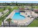 Community pool with surrounding lounge area at 6358 Granger Rd, Port Charlotte, FL 33981