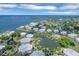 Aerial view of Placida Harbour, showcasing waterfront homes and marina at 11000 Placida Rd # 1603, Placida, FL 33946