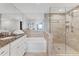 Spa-like bathroom with a large walk-in shower and soaking tub at 11000 Placida Rd # 1603, Placida, FL 33946