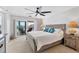 Main bedroom with a king-size bed, and plenty of natural light at 11000 Placida Rd # 1603, Placida, FL 33946