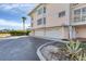 Two-car garage and manicured landscaping enhance curb appeal at 11000 Placida Rd # 1603, Placida, FL 33946