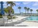 Relaxing community pool area with waterfront views and lounge chairs at 11000 Placida Rd # 1603, Placida, FL 33946