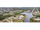 Aerial view showcasing waterfront home and neighborhood at 4106 Library St, Port Charlotte, FL 33948