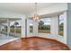 Bright dining room with hardwood floors and water views at 4106 Library St, Port Charlotte, FL 33948