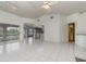 Bright living room with tile floors and views of the backyard at 4106 Library St, Port Charlotte, FL 33948