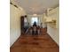 Elegant dining room with hardwood floors and a view of the kitchen at 7472 Stetson Ln, Port Charlotte, FL 33981