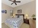 Bedroom with a queen-size bed and fish-themed bedding at 13241 Creekside Ln, Port Charlotte, FL 33953