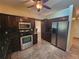 Stainless steel appliances and granite countertops in this kitchen at 1329 Sheehan Blvd, Port Charlotte, FL 33952