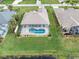 Bird's-eye view of house with a private pool at 171 Medalist Rd, Rotonda West, FL 33947