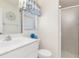 Clean bathroom with white vanity, toilet and shower at 171 Medalist Rd, Rotonda West, FL 33947