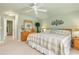 Large bedroom with access to the bathroom and hallway at 171 Medalist Rd, Rotonda West, FL 33947