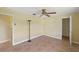 Well lit bedroom with ceiling fan and closet at 2397 Cannolot Blvd, Port Charlotte, FL 33948